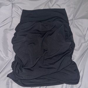 Athleta skirt ;  waist to hem about 19 in., material is 75% nylon and 25% Lycra